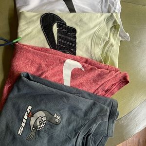 3 Nike shirts, 1 Vans, 2 Nike shorts, 1 Champion, 1 generic. Boys size 14